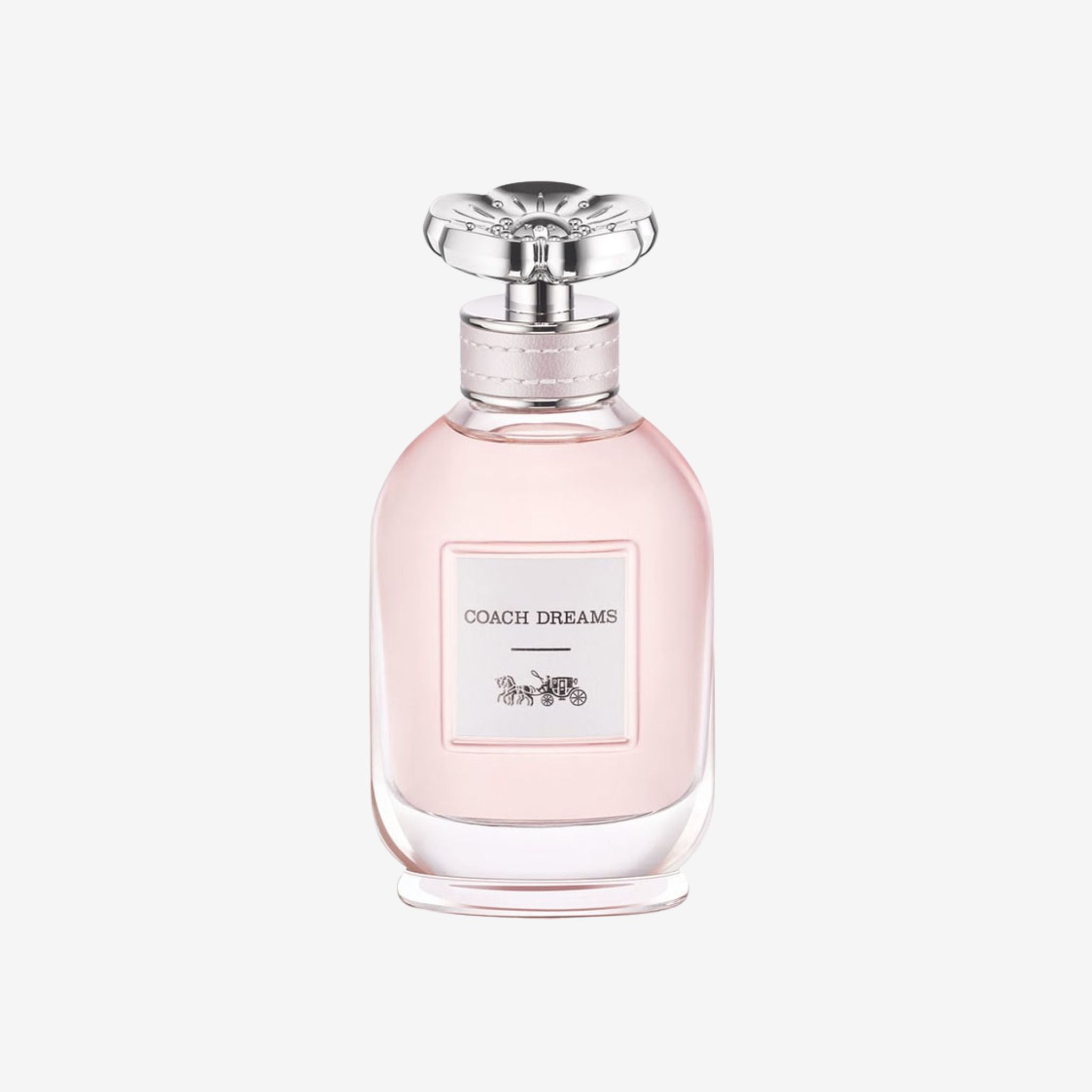 Coach Dreams Eau de Parfum bottle with silver flower cap. Fresh cactus flower and bitter orange fragrance. Best long lasting original perfume price in Pakistan.