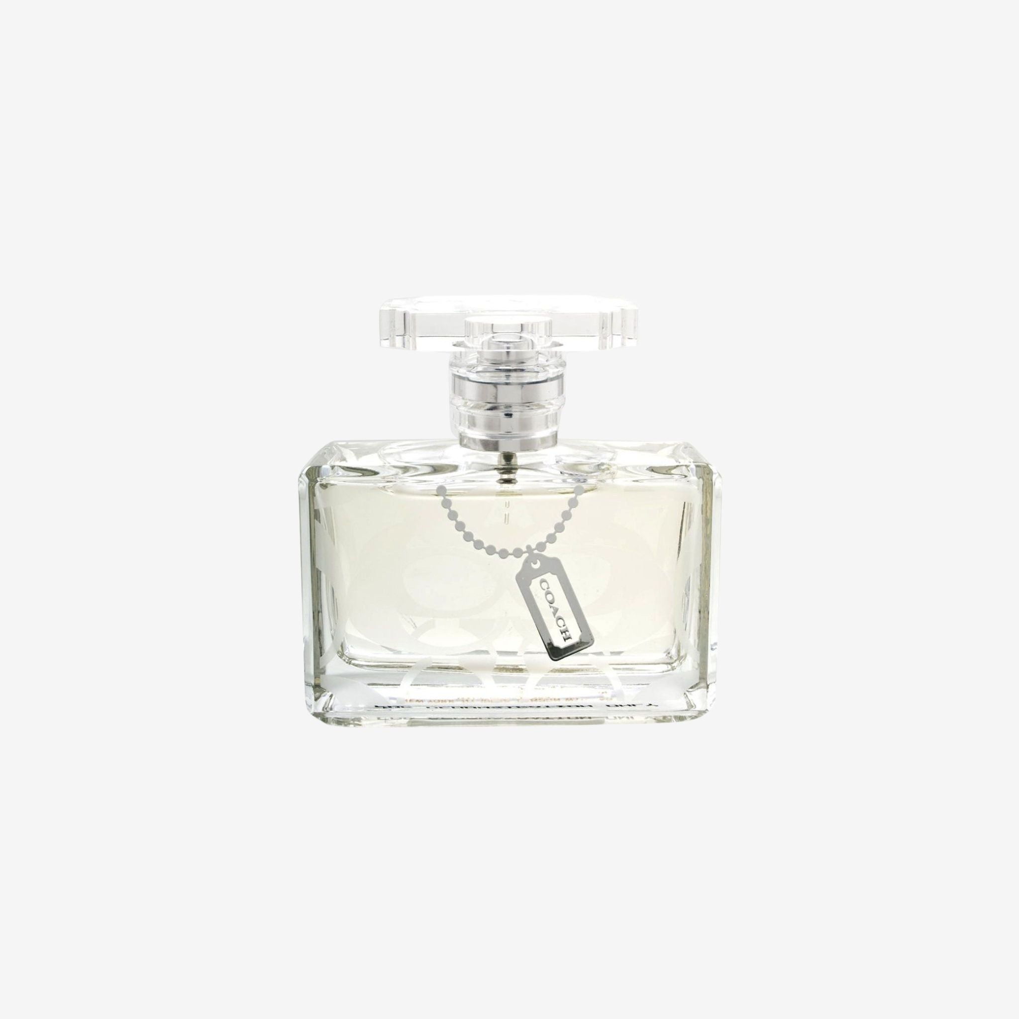 Coach New York Signature Eau de Parfum bottle with gold turn-lock cap. Raspberry and suede musk fragrance. Best long lasting original perfume in Pakistan.