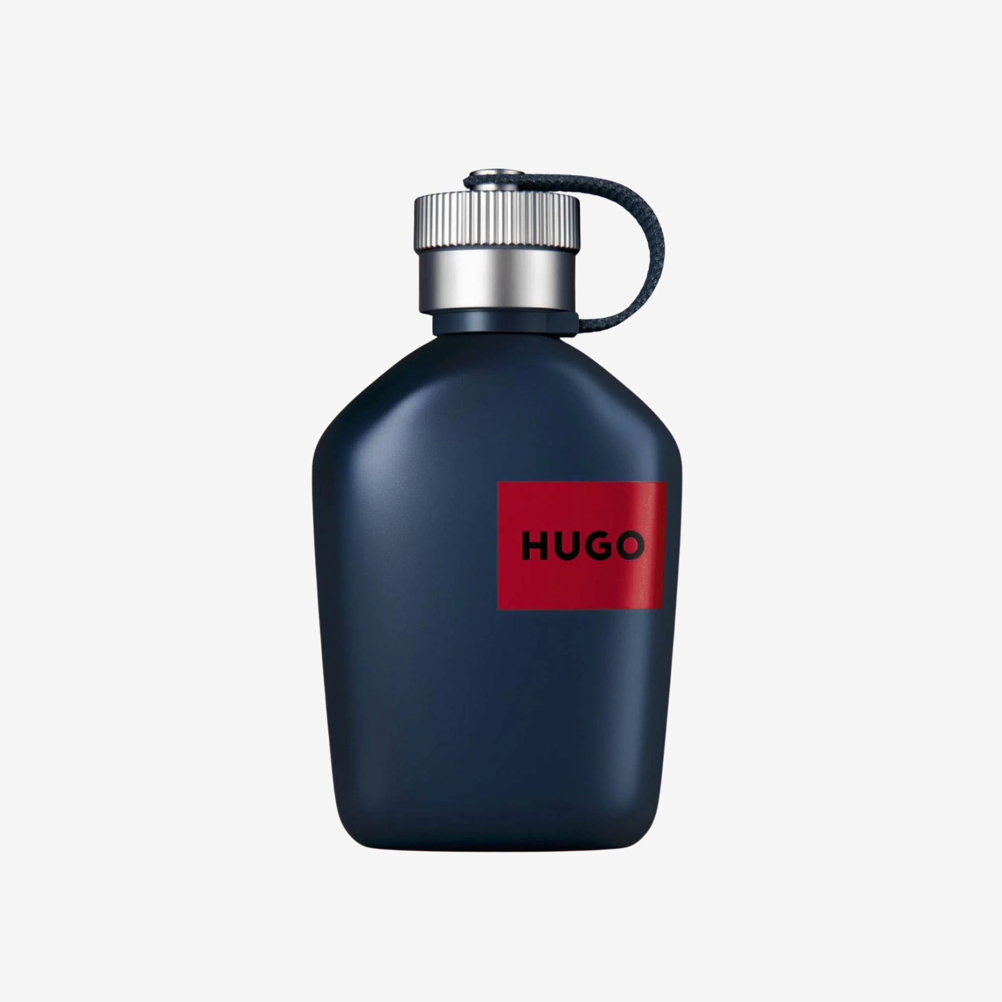Close-up of Hugo Jeans EDT 125ml bottle highlighting its rectangular glass design with blue accents and Hugo branding.