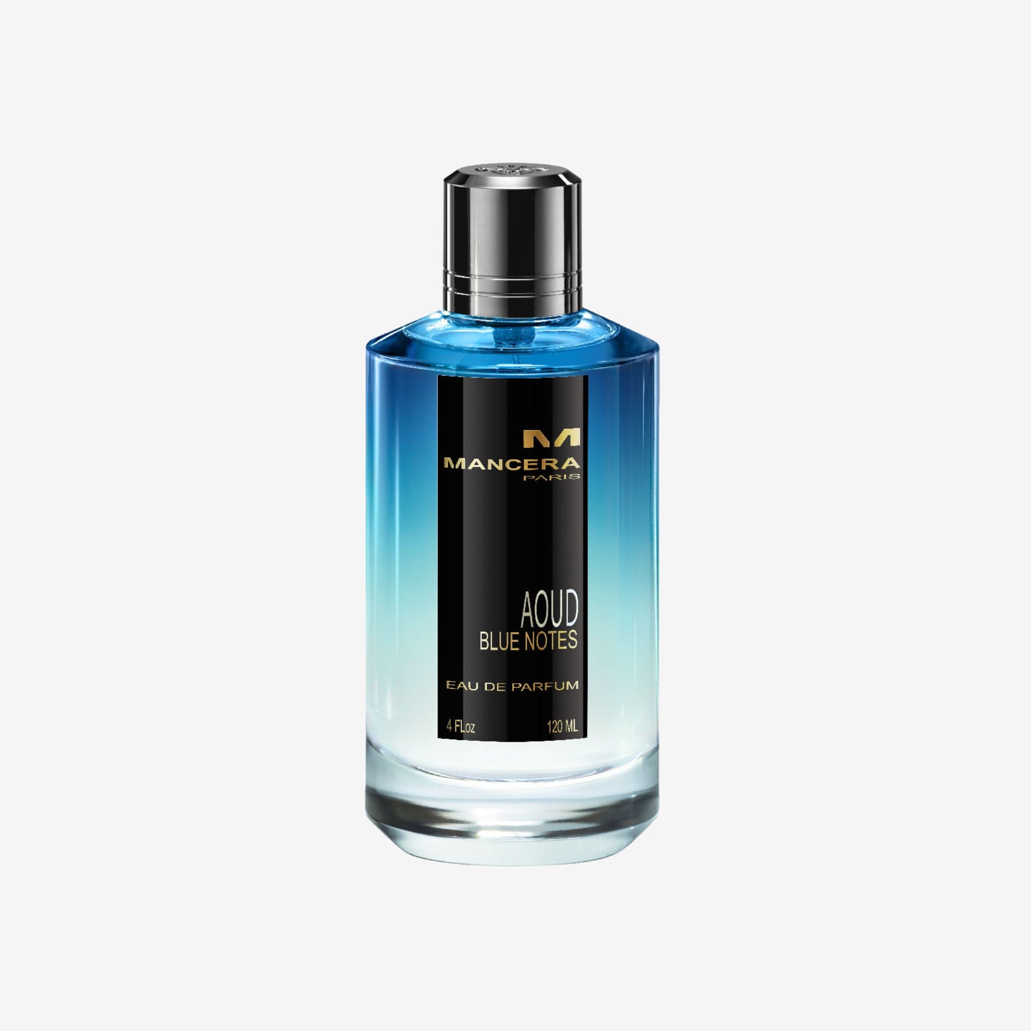 Mancera Aoud Blue Notes 120 ml perfume bottle on cream background – clear glass flacon with a polished gold cap and deep blue label, containing a rich amber‑toned liquid.