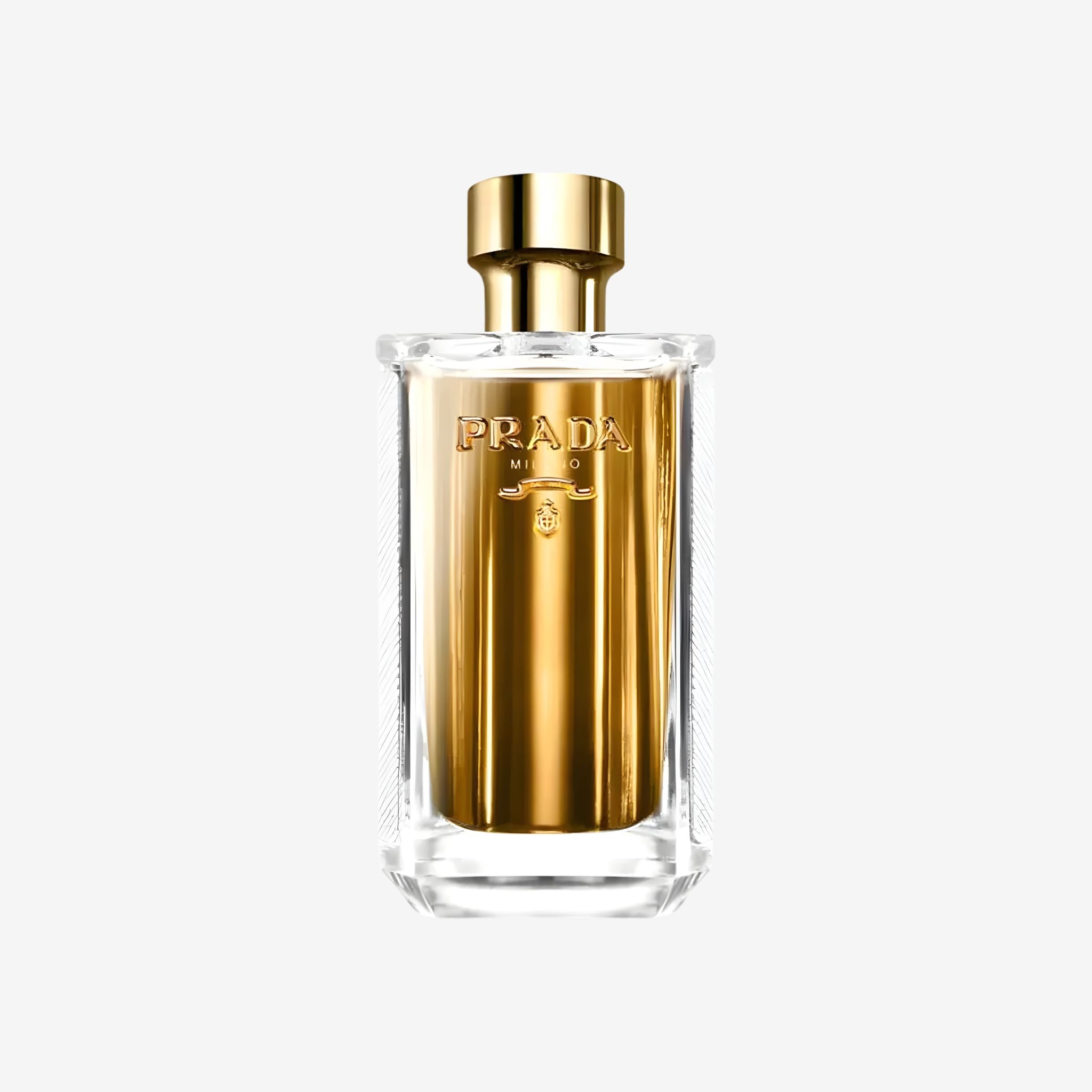 Close-up of Prada La Femme EDP 100ml bottle featuring golden tones and sophisticated Prada branding that reflect timeless femininity.