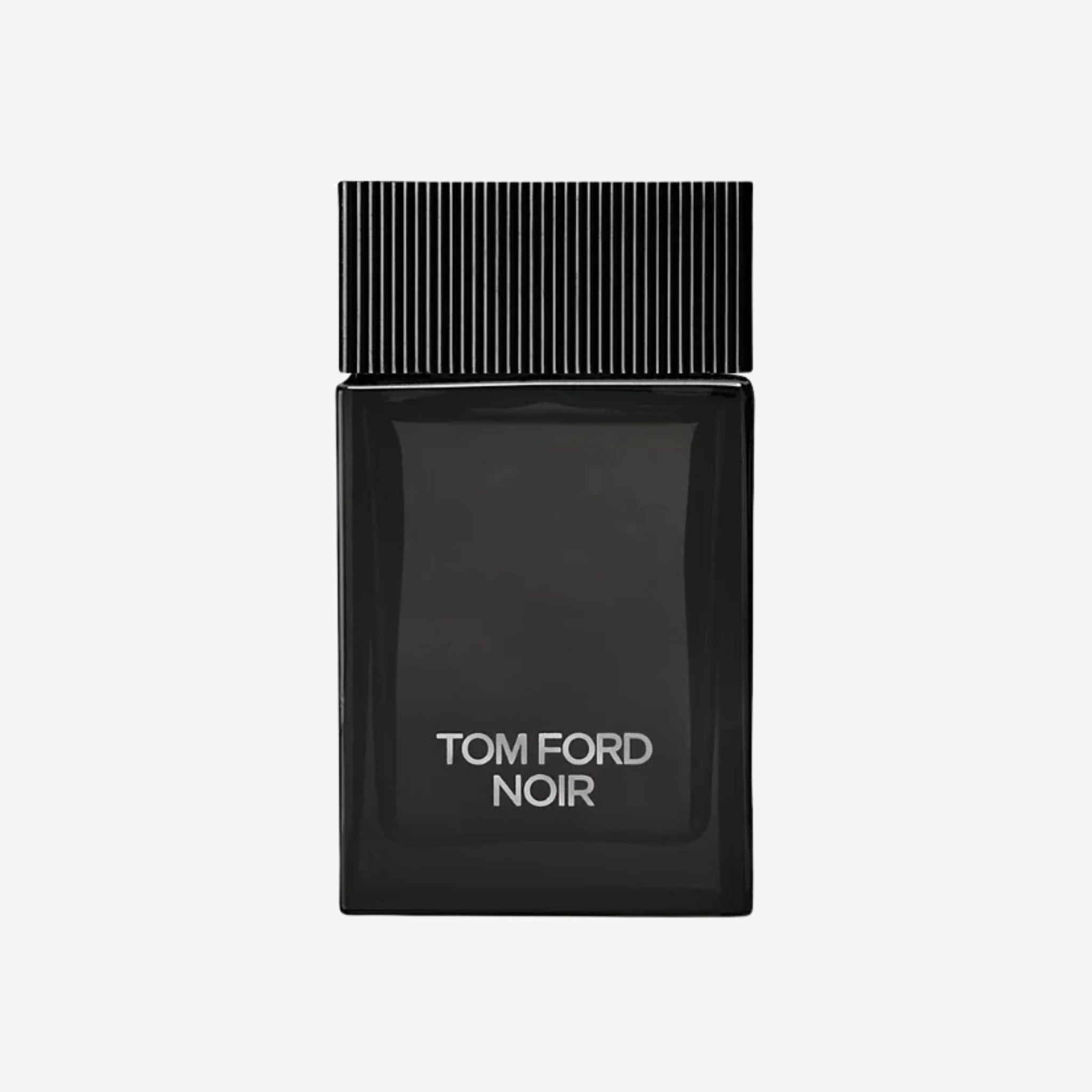 Tom Ford Noir perfume bottle on a light grey background showcasing its sleek black design and refined masculine elegance.