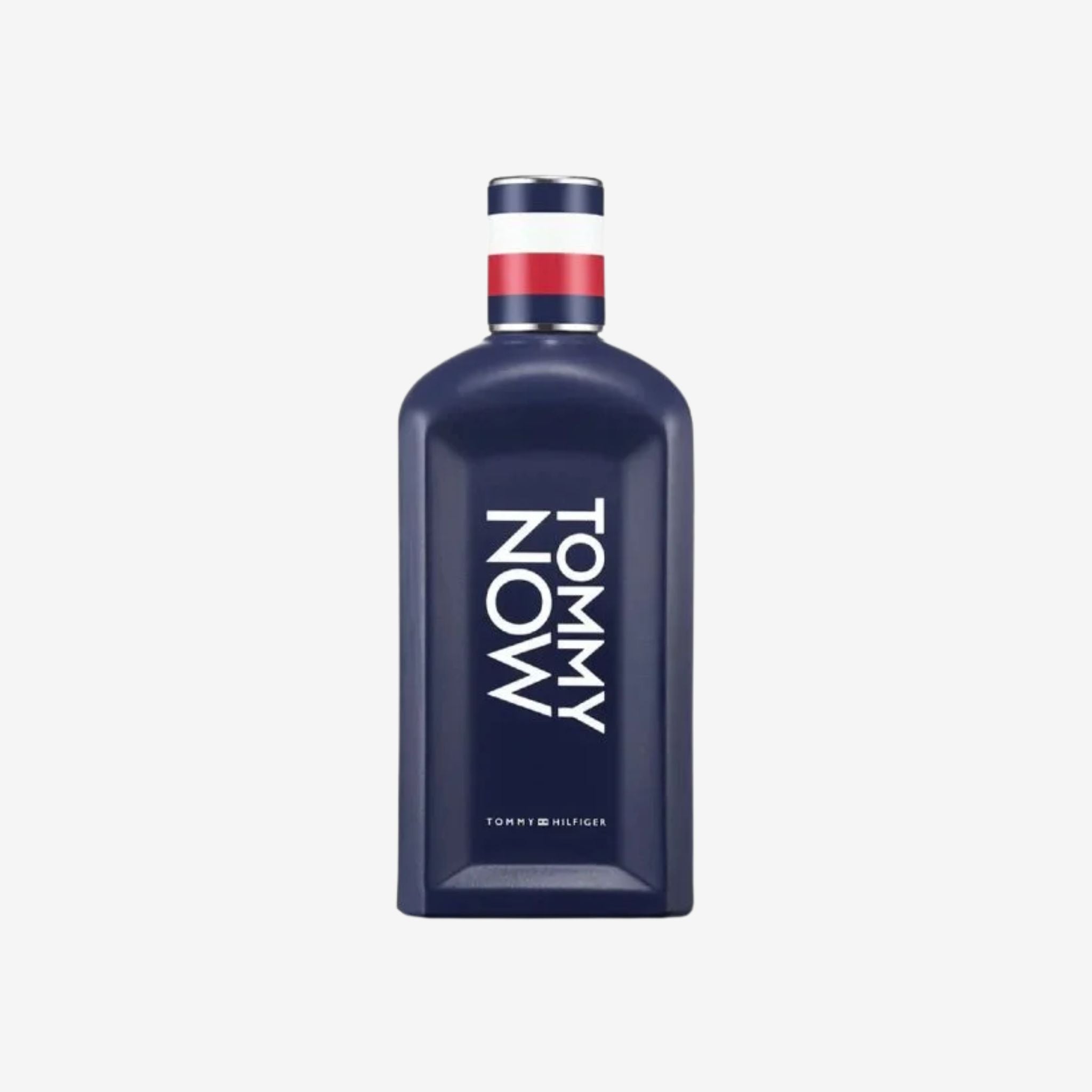 Tommy Now For Men Eau de Toilette bottle with navy blue cap. Fresh ginger, citrus, and amberwood fragrance. Best woody spicy original perfume for men price in Pakistan.