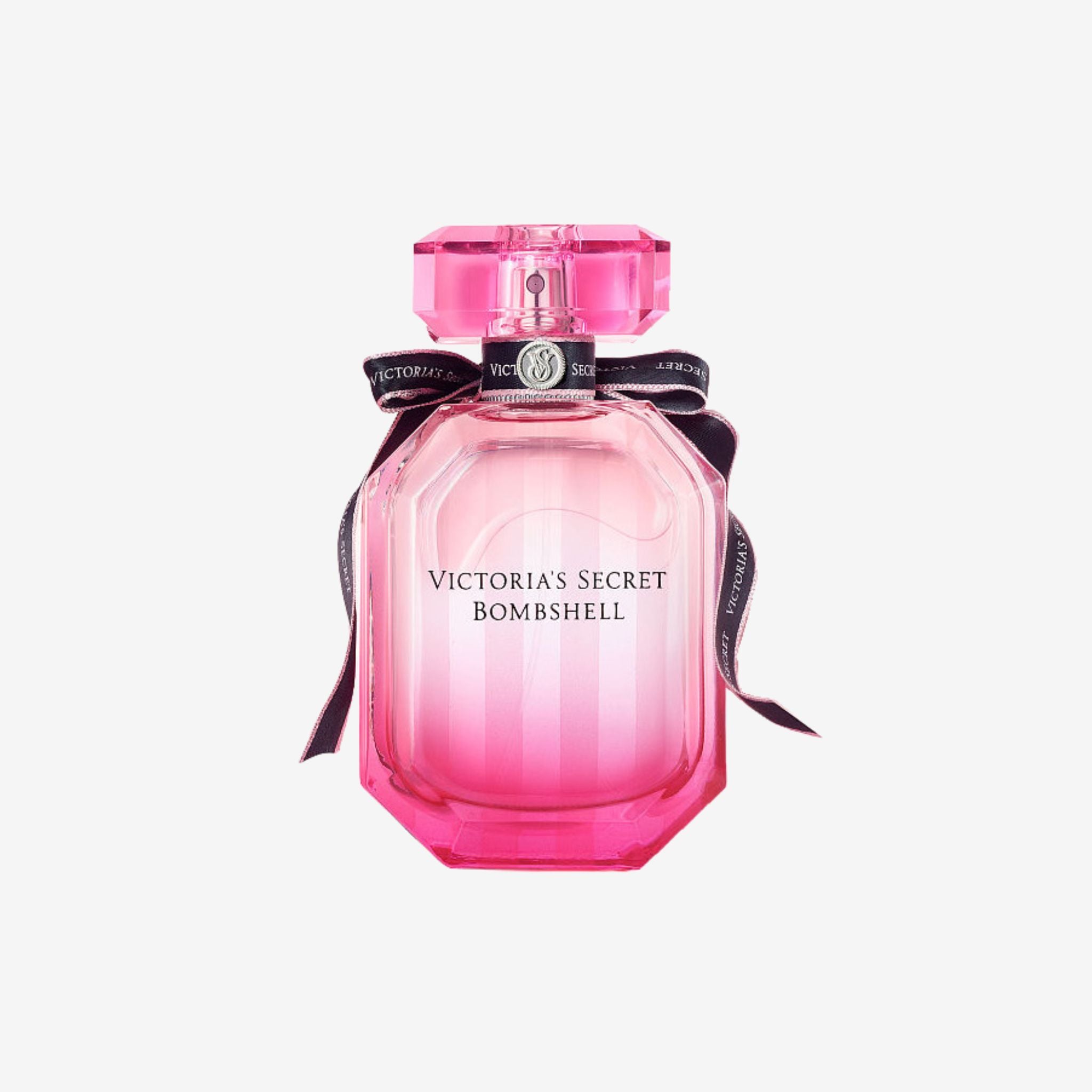Victoria’s Secret Bombshell EDP perfume bottle on a light grey background showcasing its pink translucent bottle and elegant feminine design.