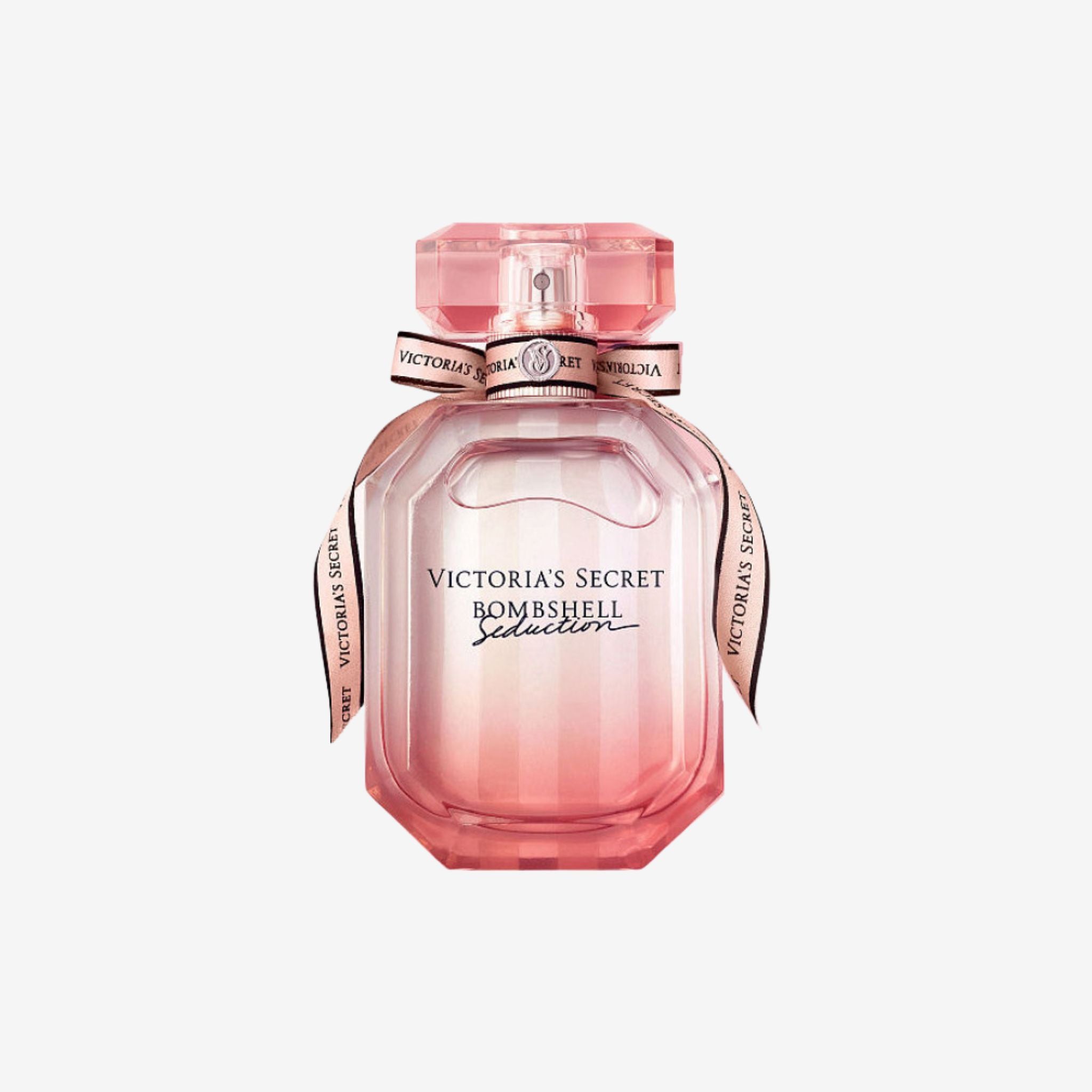 Victoria’s Secret Bombshell Seduction EDP perfume bottle on a light grey background showcasing its elegant pink gradient design and feminine style.